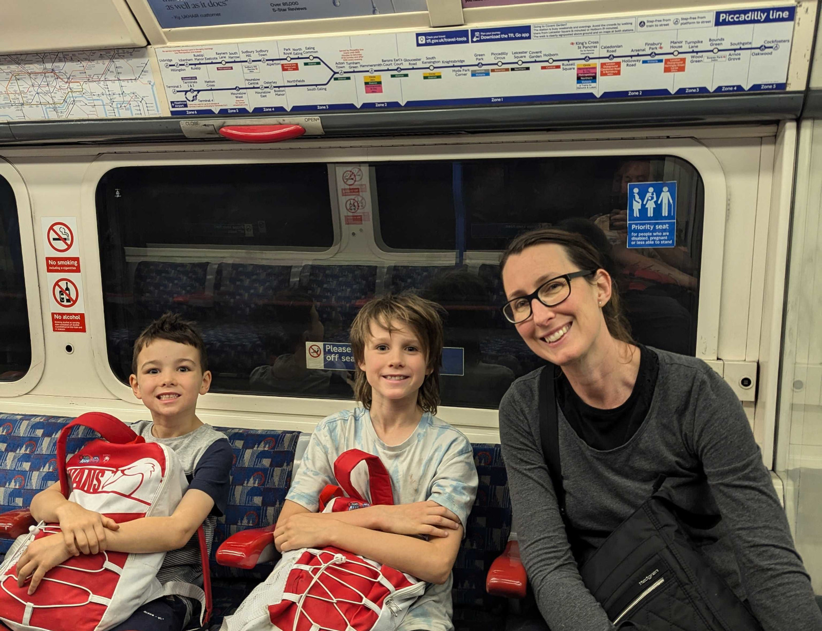 Miles, Jake and Sonia on the tube