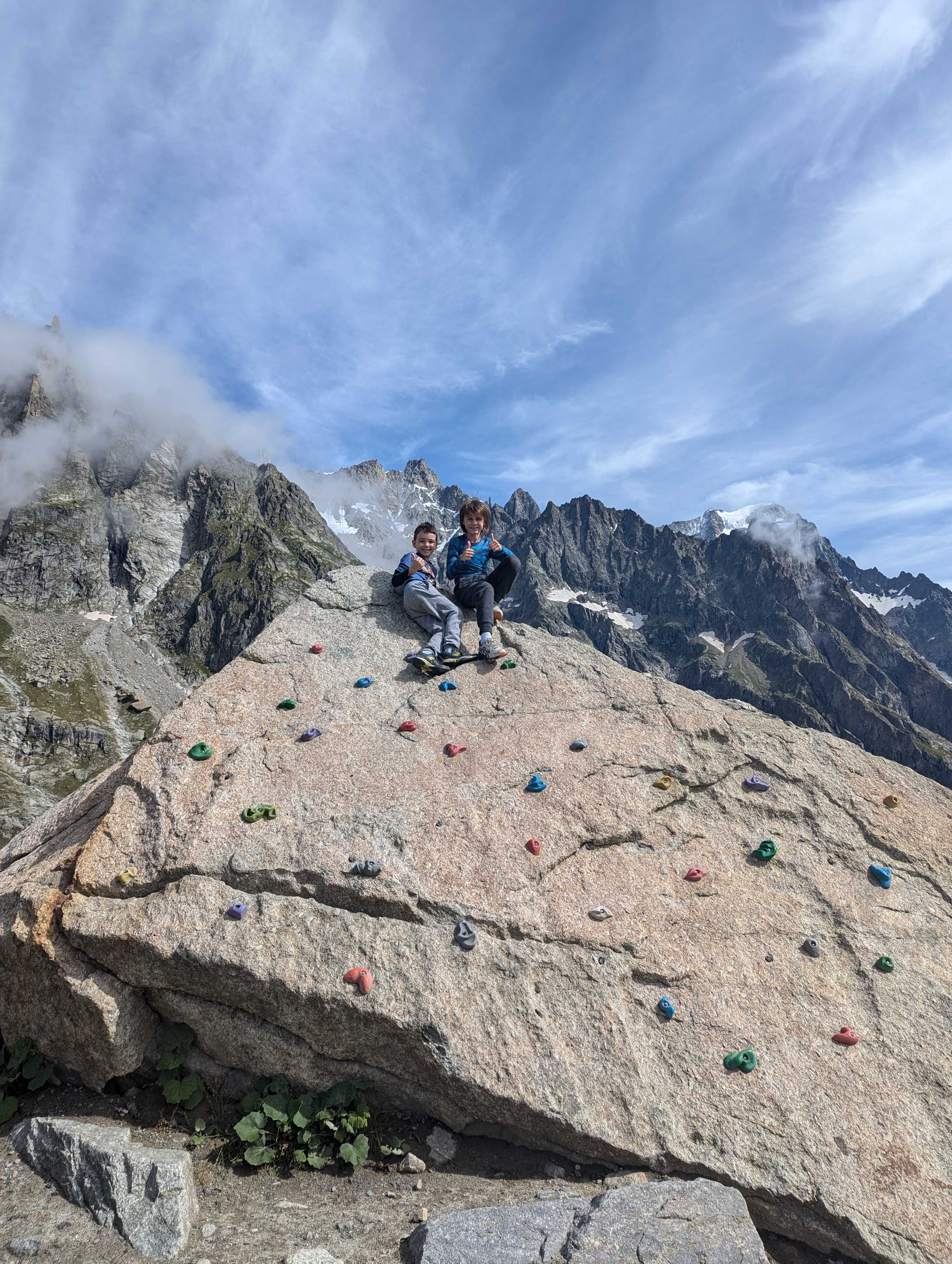 Jake and Miles conquer a rock