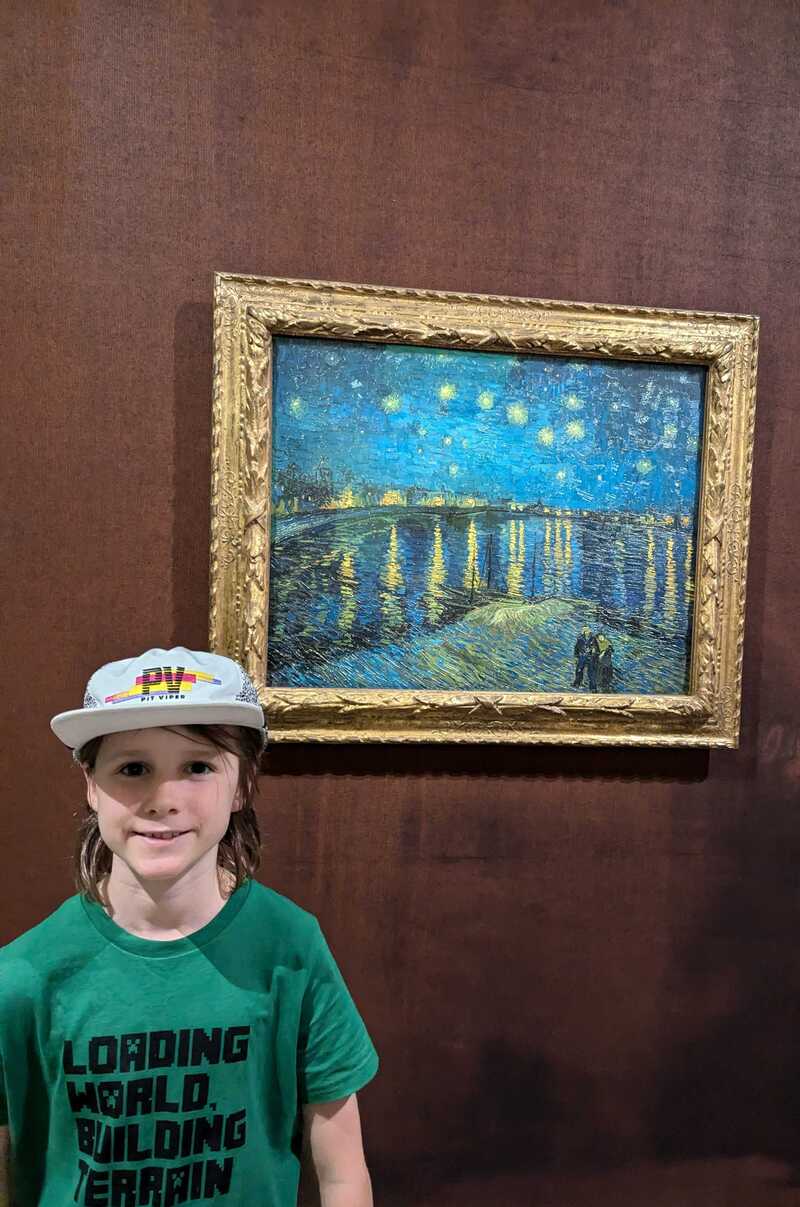 Jake standing next to _Starry Night Over the Rhône