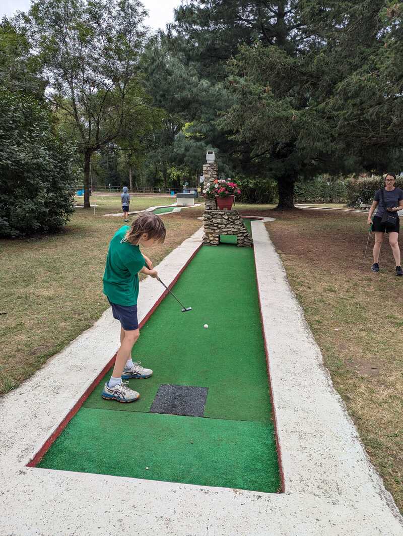 Jake playing mini golf