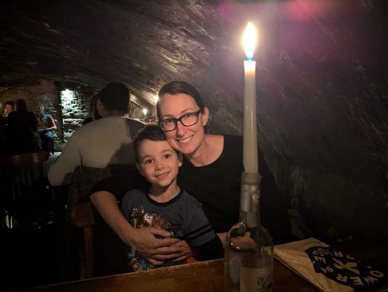 Sonia and Miles in a cave